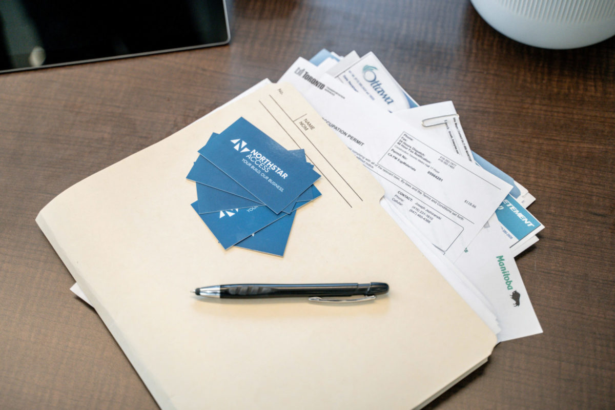 Folder, Paper, Pen & Northstar Access Business Cards