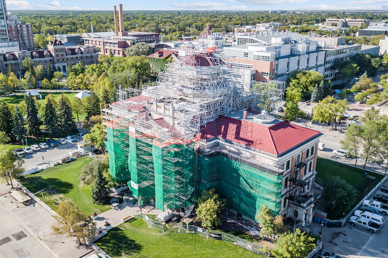 Heritage Building Scaffolding at the University of Manitoba with debris mesh enclosure