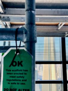 image of green scaffold inspection tag